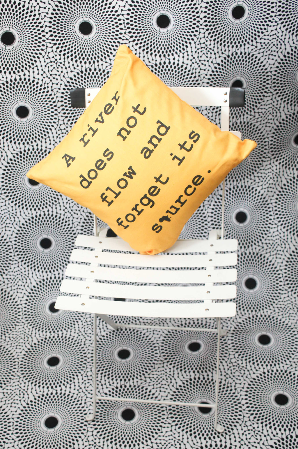 Yoruba Proverb Art Cushion: ‘A river does not flow and forgets its source’